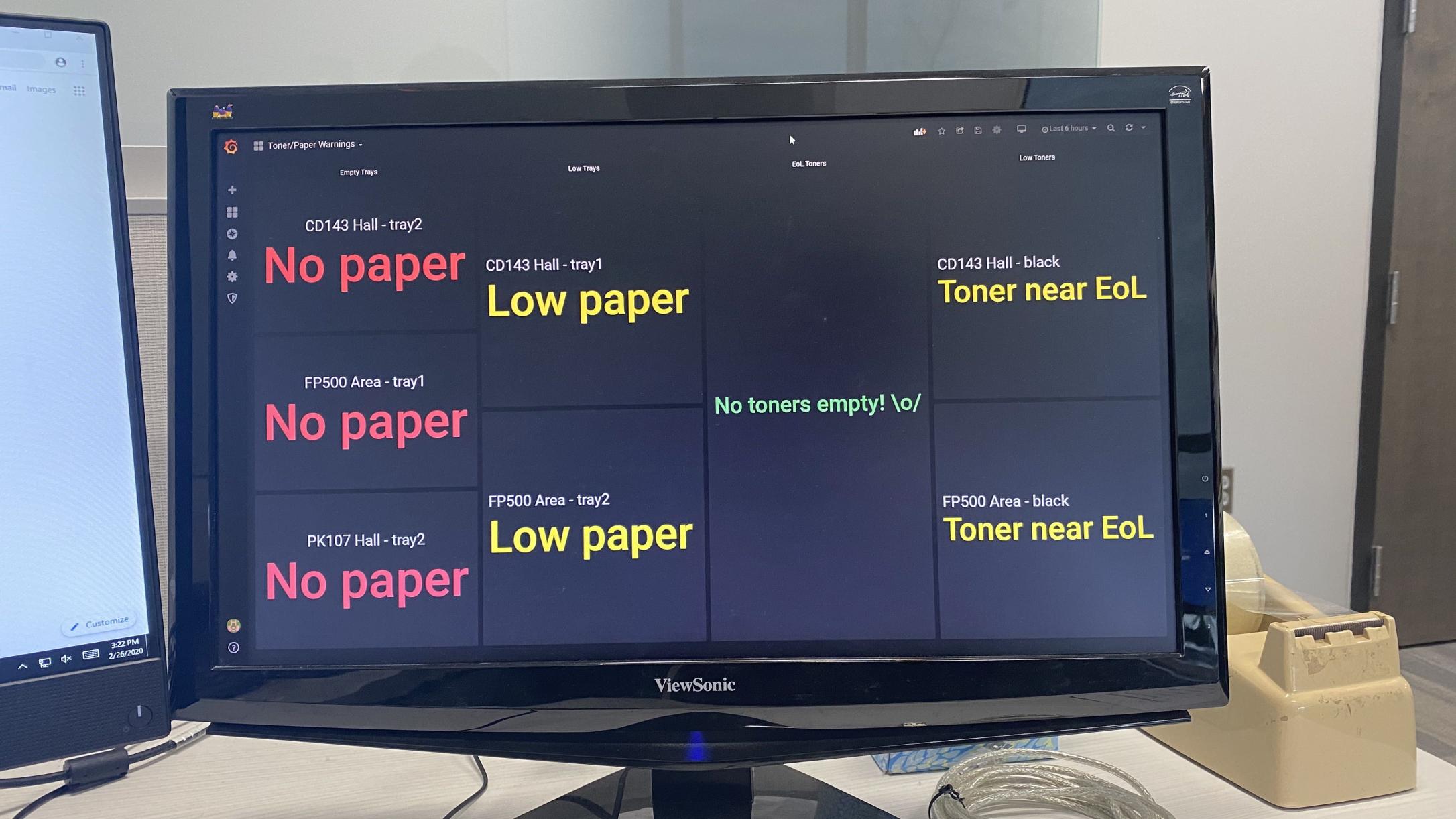 A computer monitor showing text that describes the states of multiple printers.