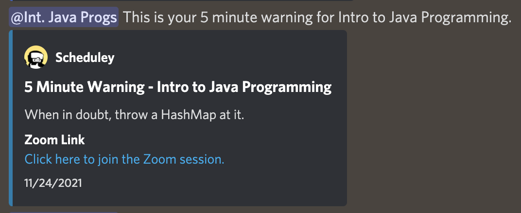 A photo of a Discord channel, showing the Scheduley bot notifying someone of a class named Intro to Java Programming.